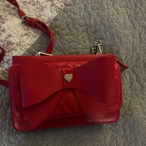 New without tags Betsy Johnson beautiful cherry red clutch with chain strap.